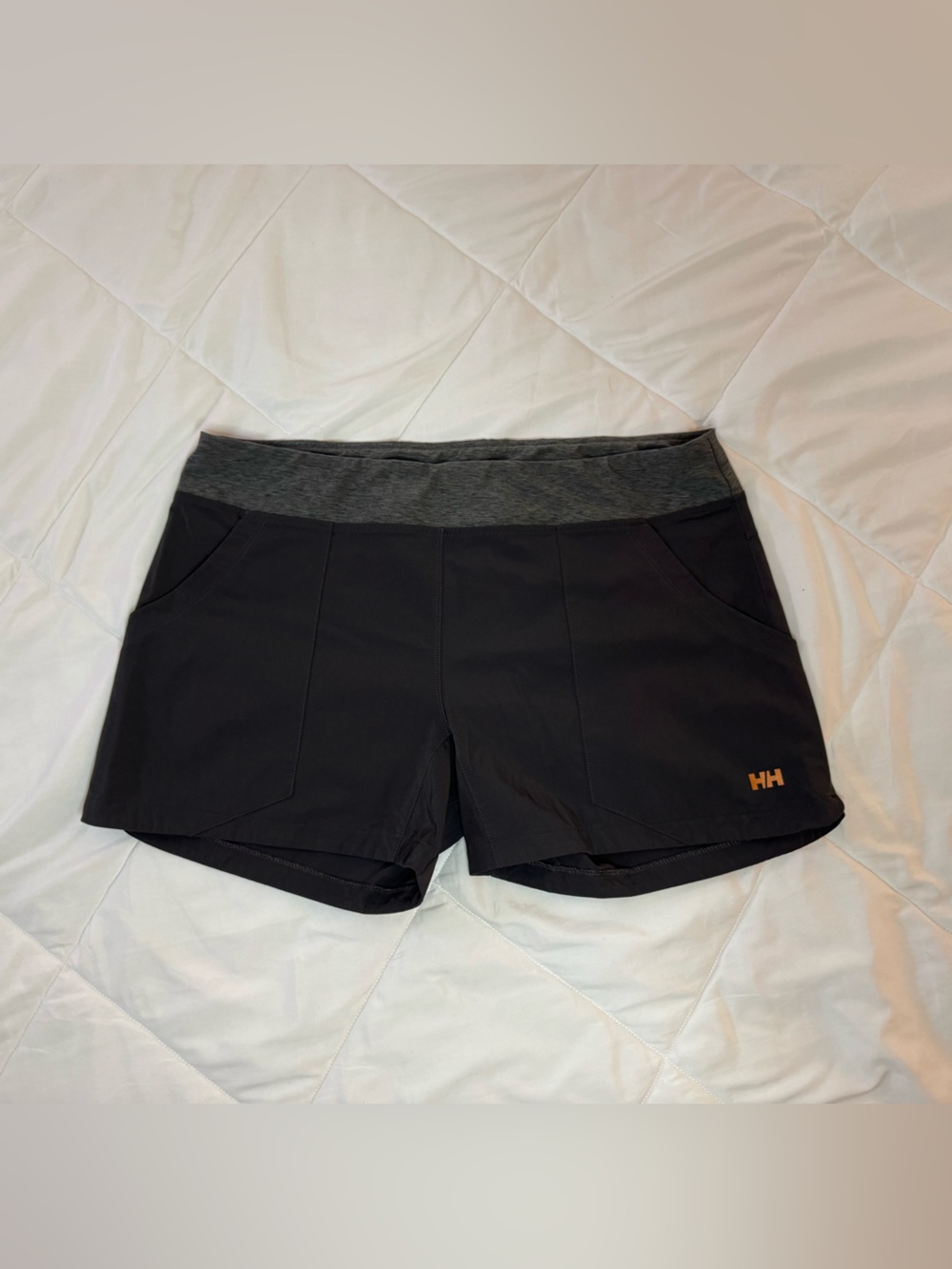 Helly Hansen Black Athletic Shorts with Gray Waistband and Orange Logo